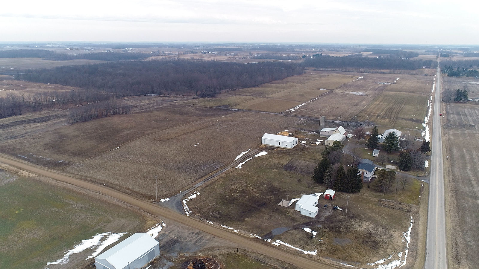 FARMLAND AUCTION RESCHEDULED FARM AUCTION 85 ACRES OFFERED